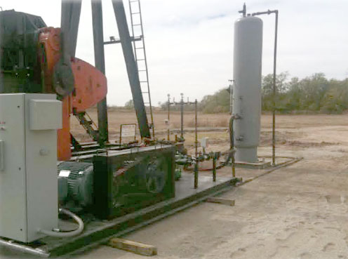 image of two wellsite operators walking the site